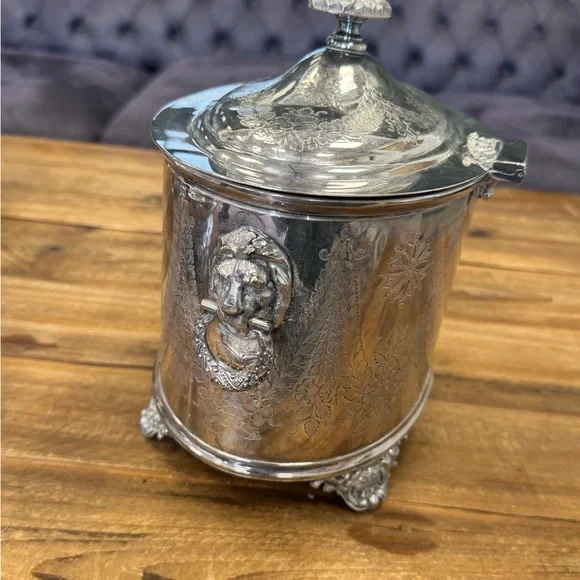 Stunning silver plated large footed bisc box with lions